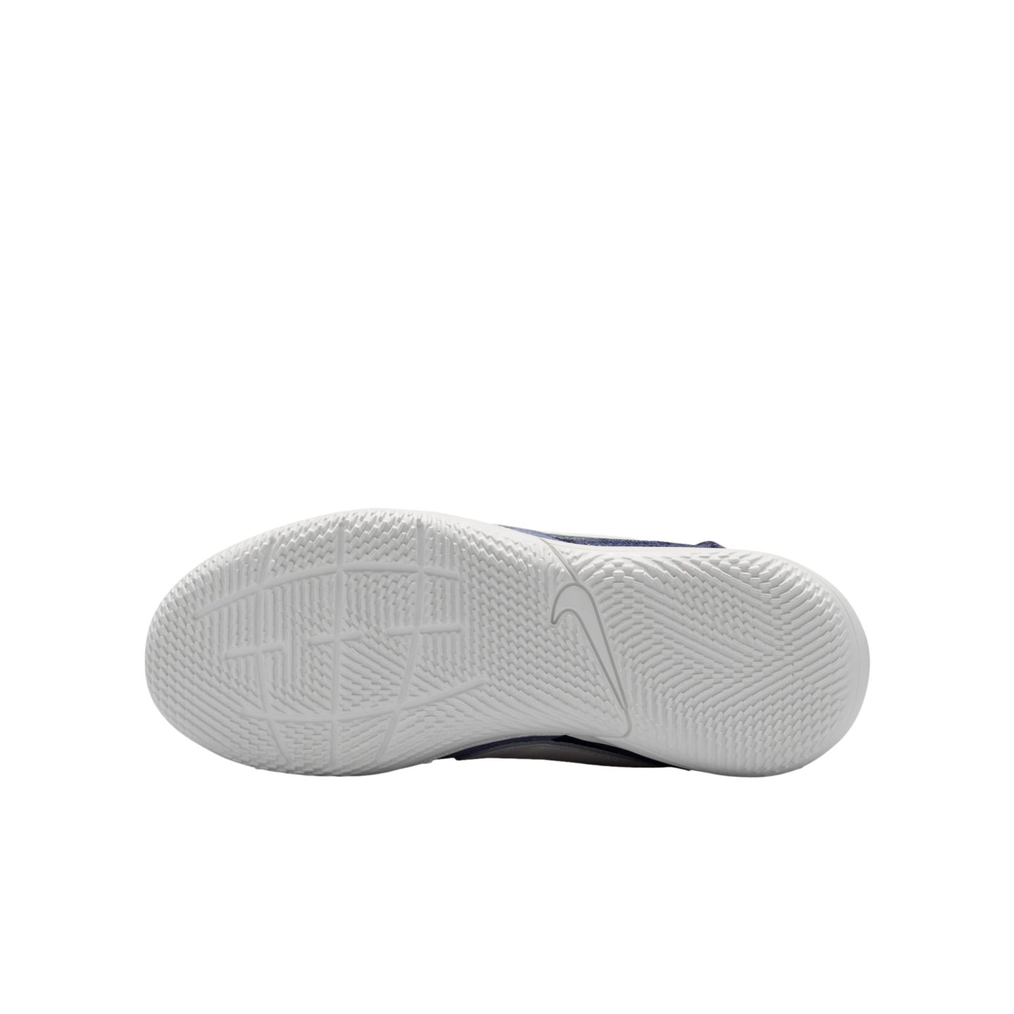 The white textured outsole of a Nike athletic shoe, featuring a detailed traction pattern and a swoosh logo near the heel.
