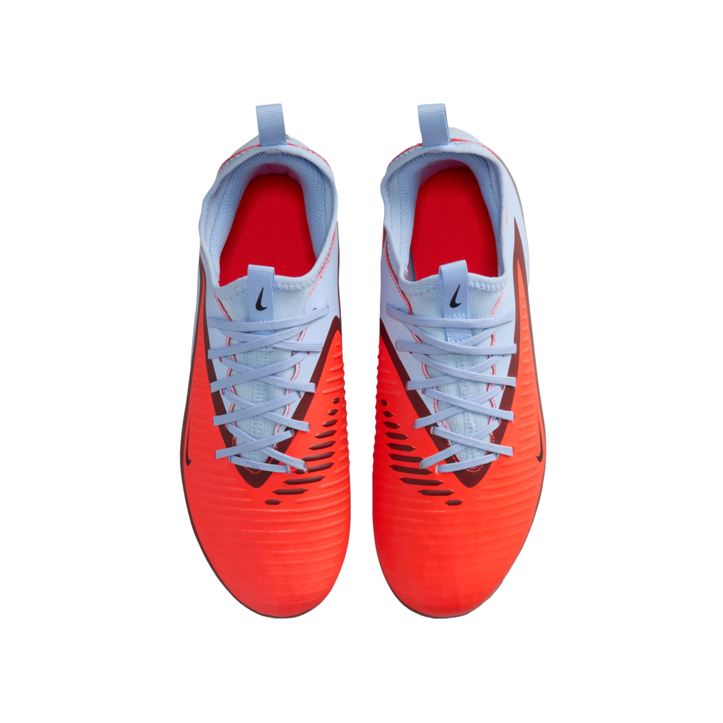 Top-down view of Nike soccer cleats with a bright orange forefoot, light blue laces and upper, and red interior, isolated on a black background.