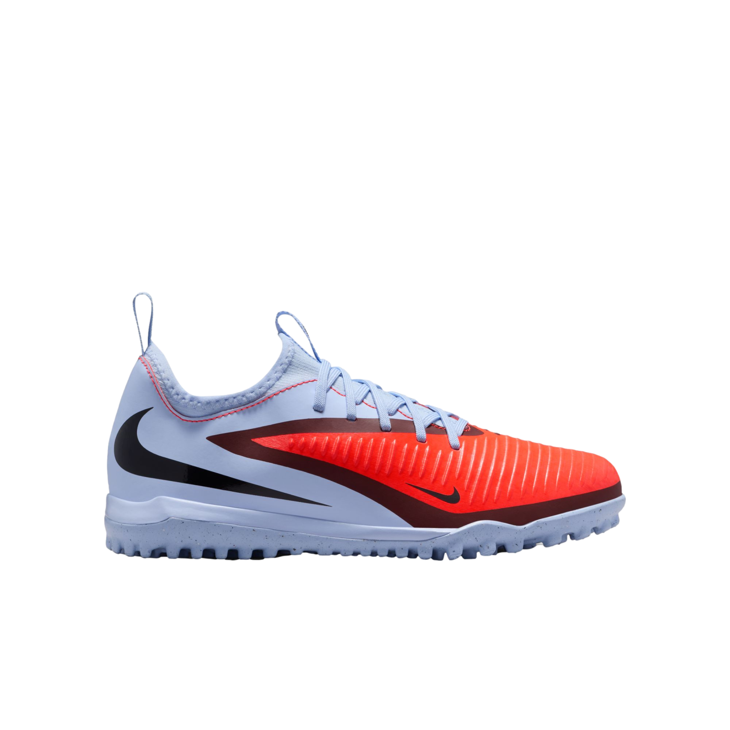 A light blue and bright orange Nike turf soccer shoe with a textured front, black swoosh, and speckled rubber sole.