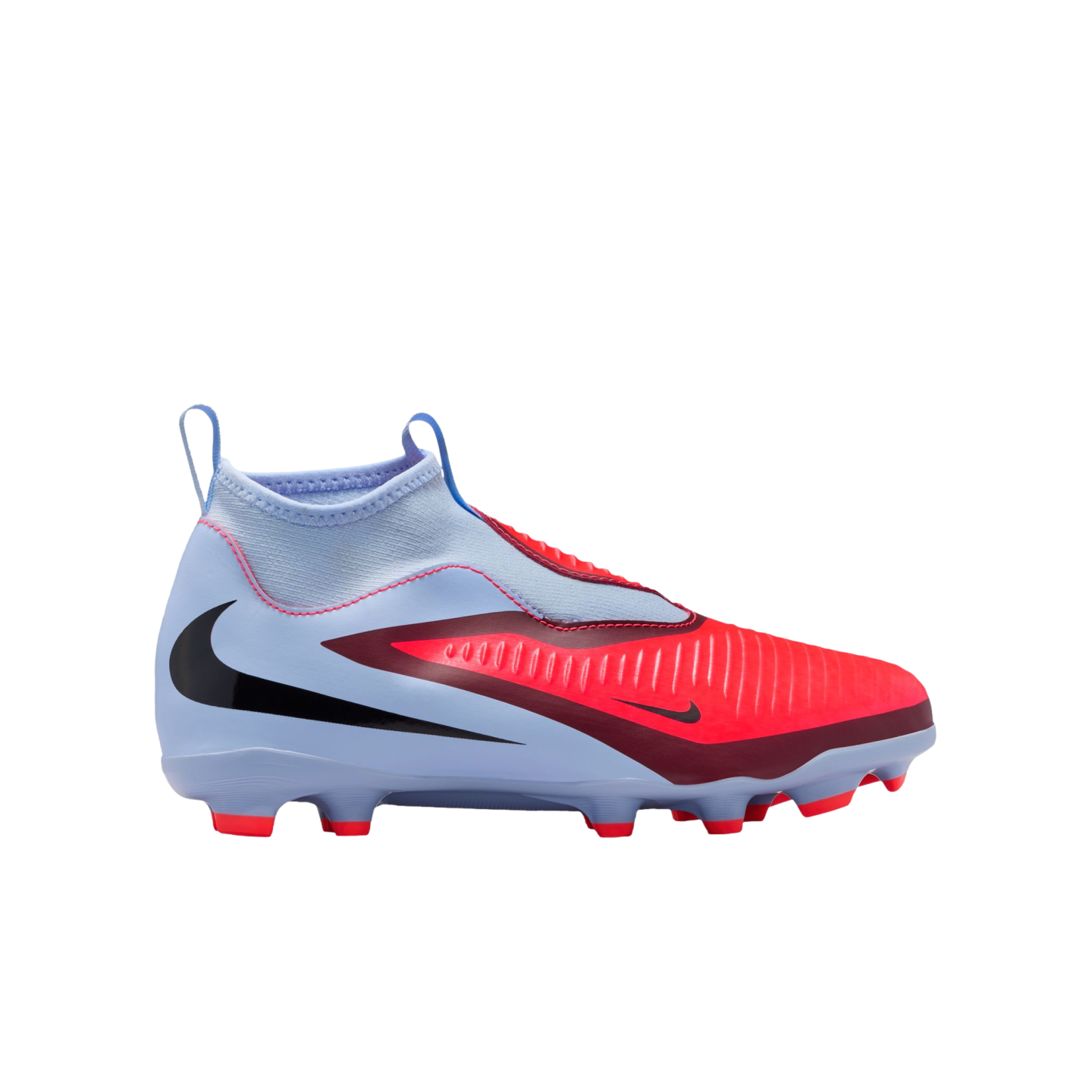 Profile of a light blue and bright red Nike laceless soccer cleat with a black swoosh, shown against a black background.