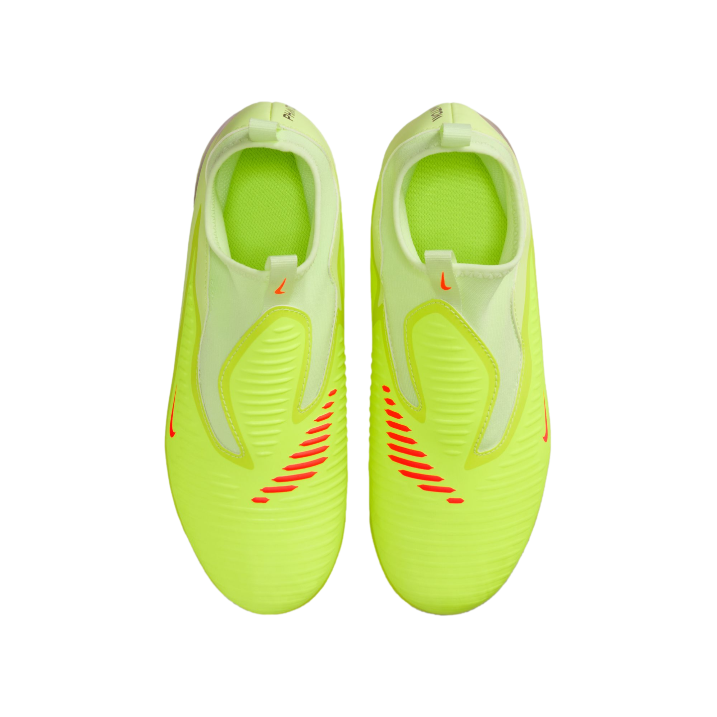 Aerial view of neon yellow Nike laceless soccer cleats with red accents on a black background.