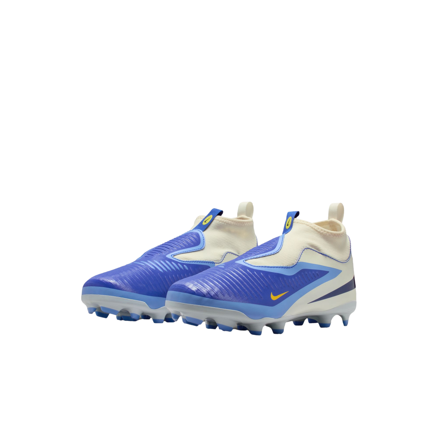 A pair of blue and white Nike kids' laceless soccer cleats with yellow accents, set against a black background.