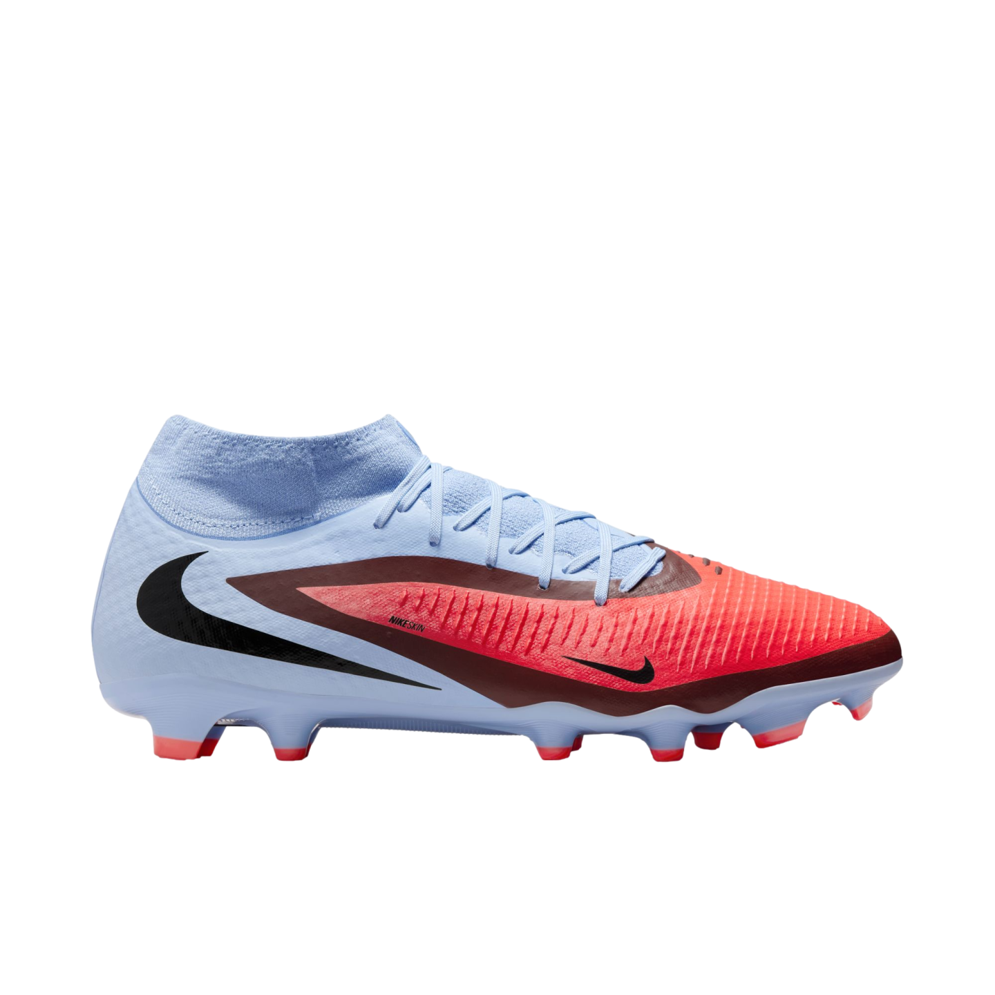 A light blue and bright red Nike soccer cleat with a sock-like collar, shown in profile against a black background.