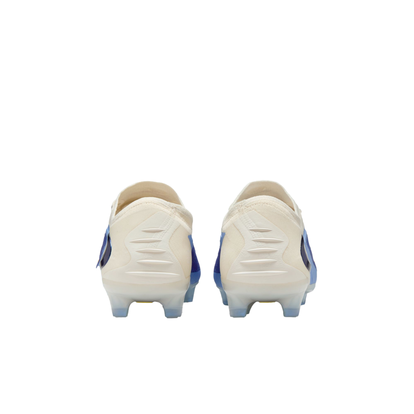Rear view of a pair of cream and blue soccer cleats with textured heels and clear studs, centered on a white background.
