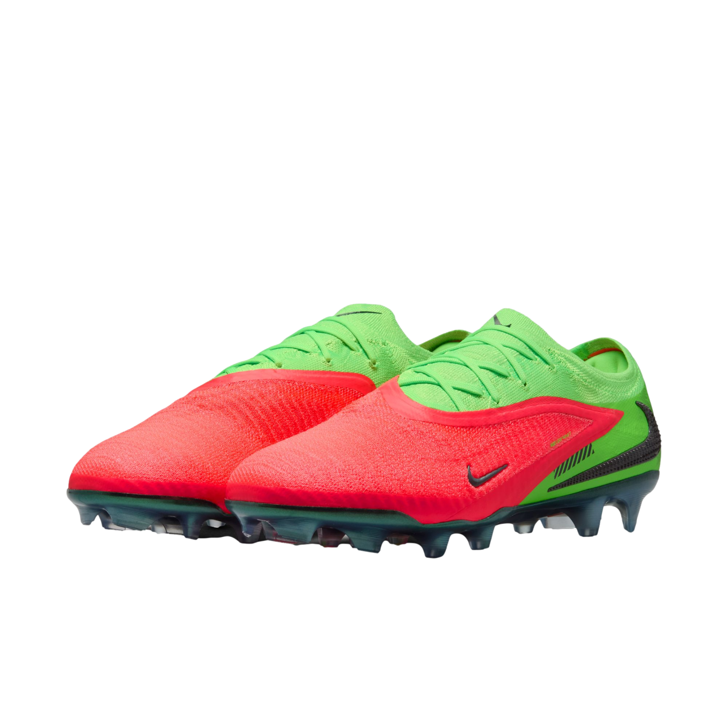 A pair of lime green and neon red Nike soccer cleats displayed against a black background. The cleats feature a vibrant red textured forefoot, green heel and lacing area, and clear green-tinted studs.