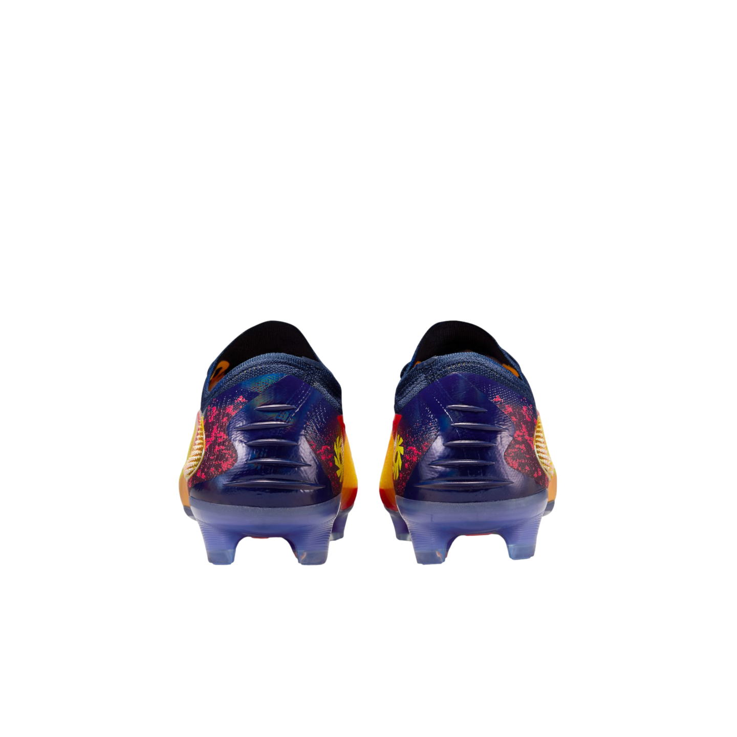 Rear view of two soccer cleats with dark blue, pink, and yellow patterns and translucent light blue studs.