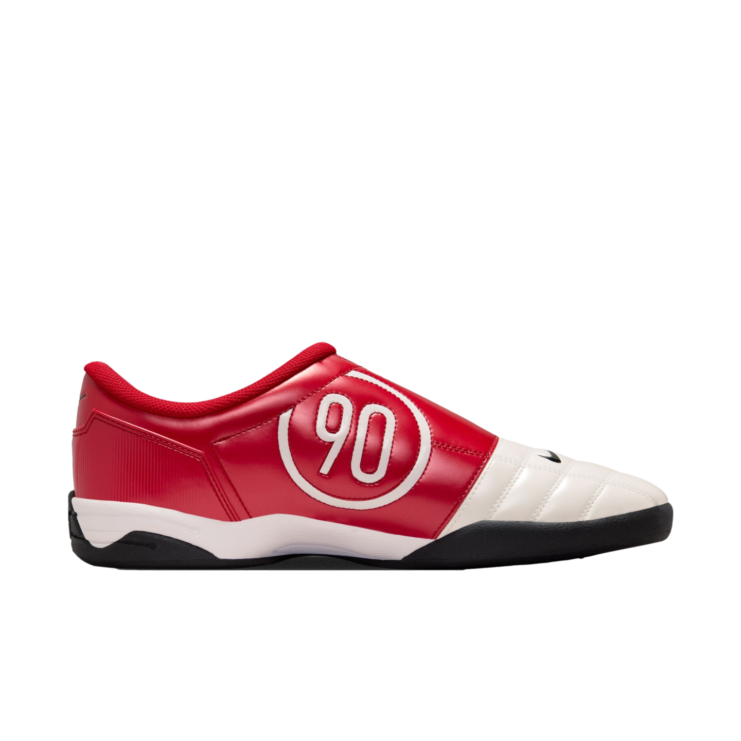 Side profile of a red and white indoor soccer shoe featuring a large white circular "90" logo, a white toe cap, and a black outsole against a white background.
