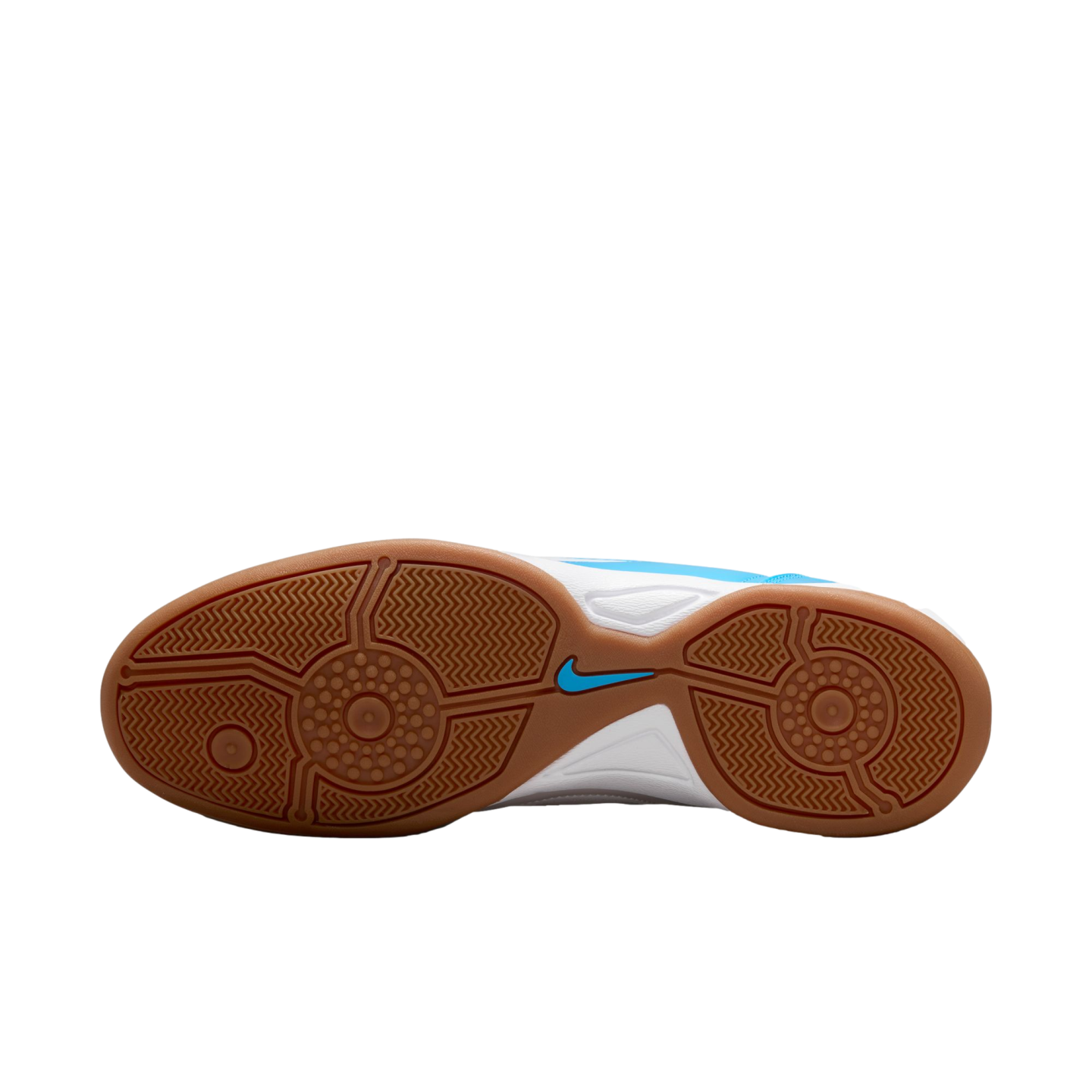 The bottom view of a Nike shoe with a textured brown gum rubber outsole, white midsole, and blue accents. A small blue Nike swoosh is located in the center of the sole.