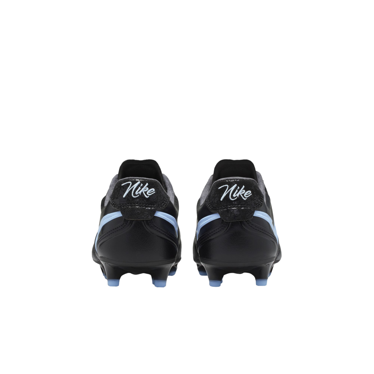 Rear view of black Nike soccer cleats with light blue accents and cursive branding on the heel tabs.