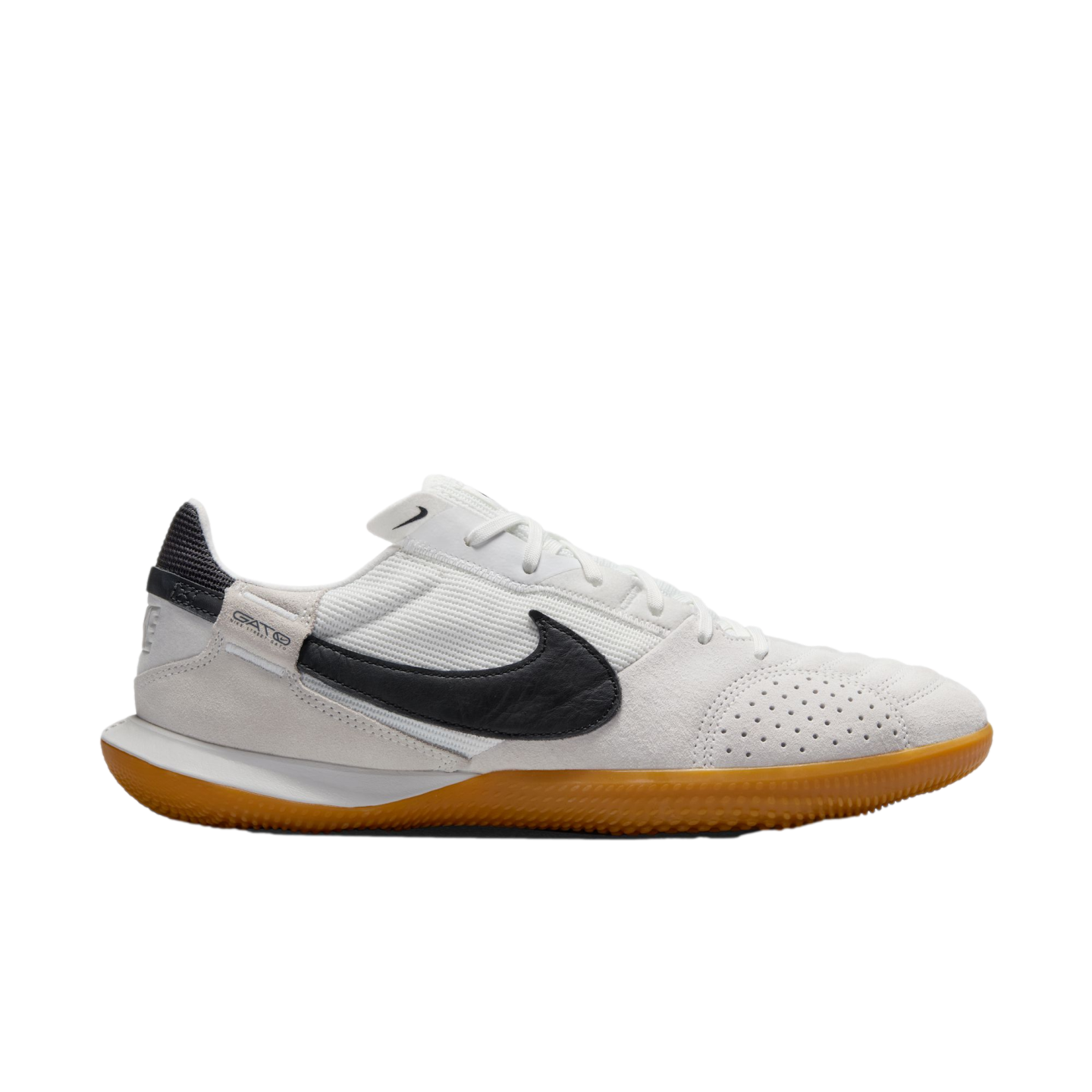 A side-view image of a white and black Nike Street Gato indoor soccer shoe with a gum rubber sole.