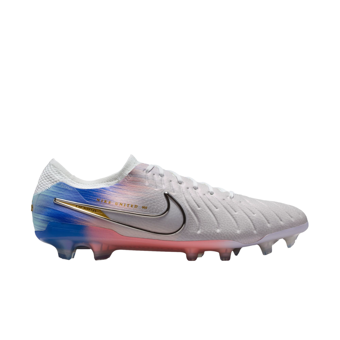 A side view of a white Nike soccer cleat featuring a textured upper, a silver swoosh, and a colorful blue-to-orange gradient on the heel and sole.