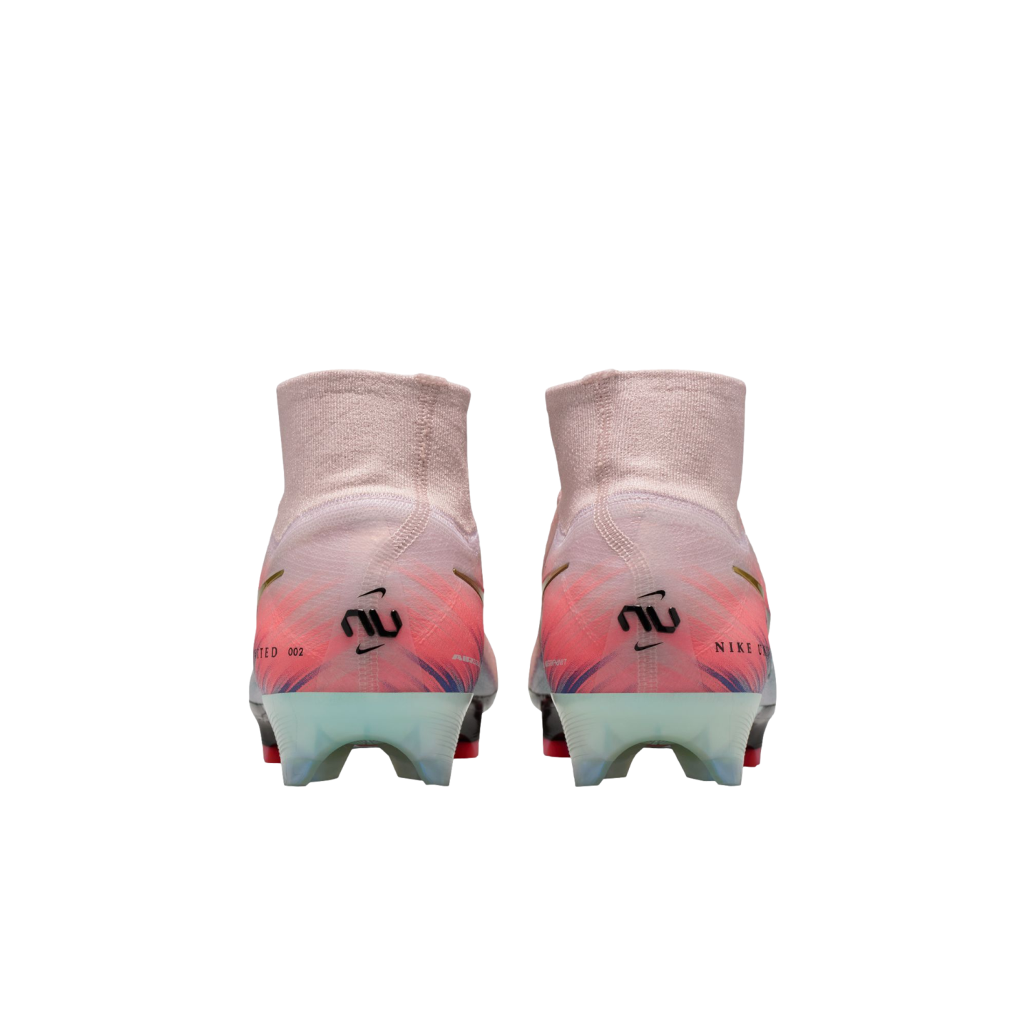 Rear view of Nike soccer cleats in pink and orange, featuring a high knit ankle collar, "NU" heel logos, and translucent outsoles.