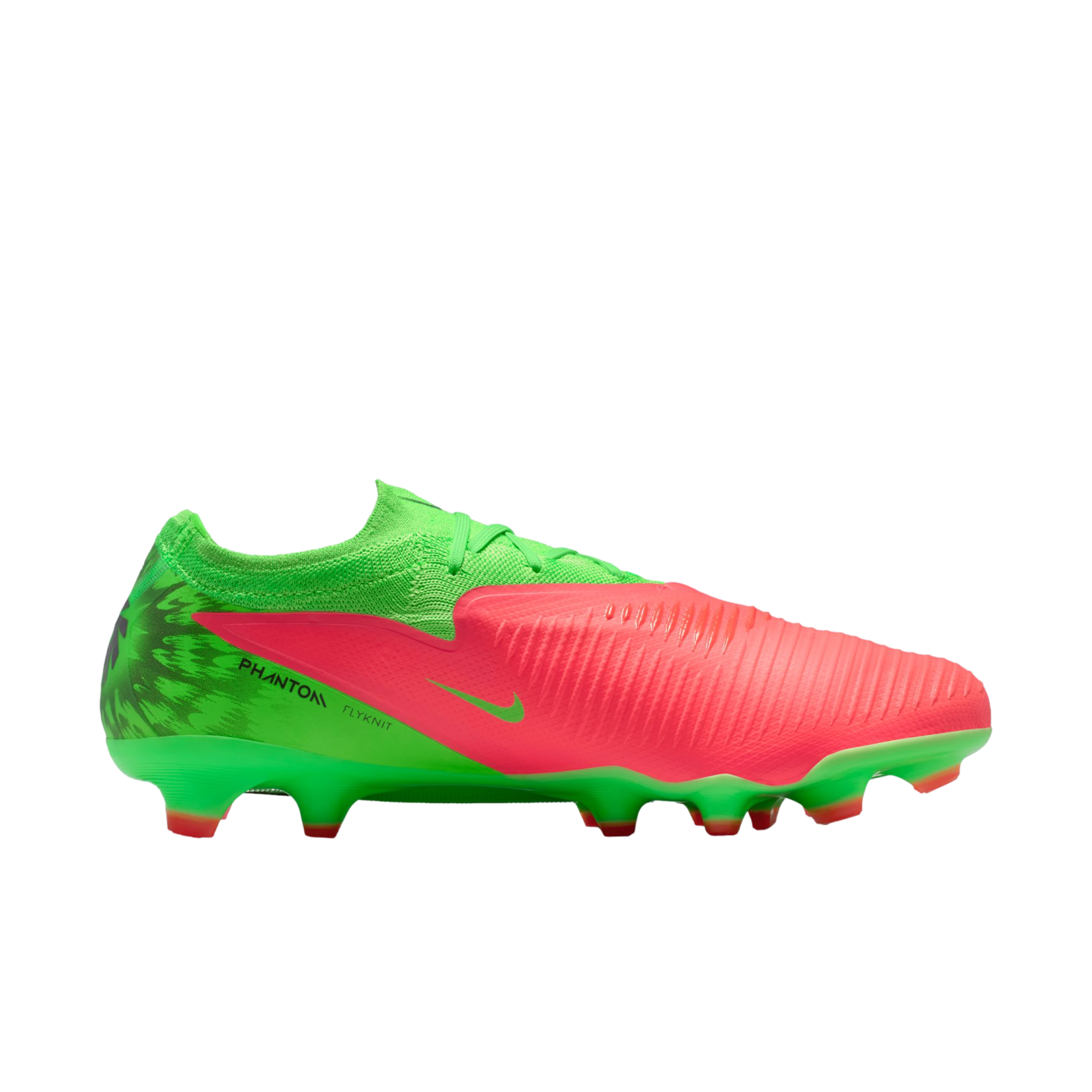 A side profile of a Nike Phantom Flyknit soccer cleat in vibrant lime green and bright coral pink, set against a solid black background.