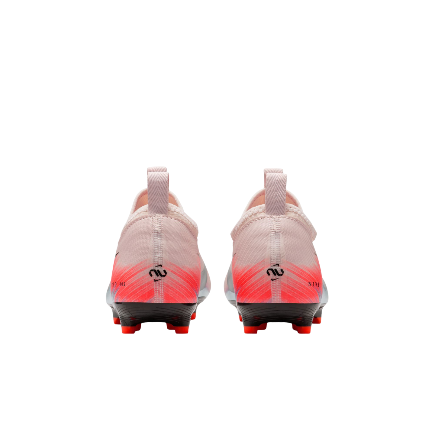 Rear view of pale pink Nike soccer cleats with bright orange heel graphics, Neymar Jr. logos, and black soles, isolated on a black background.