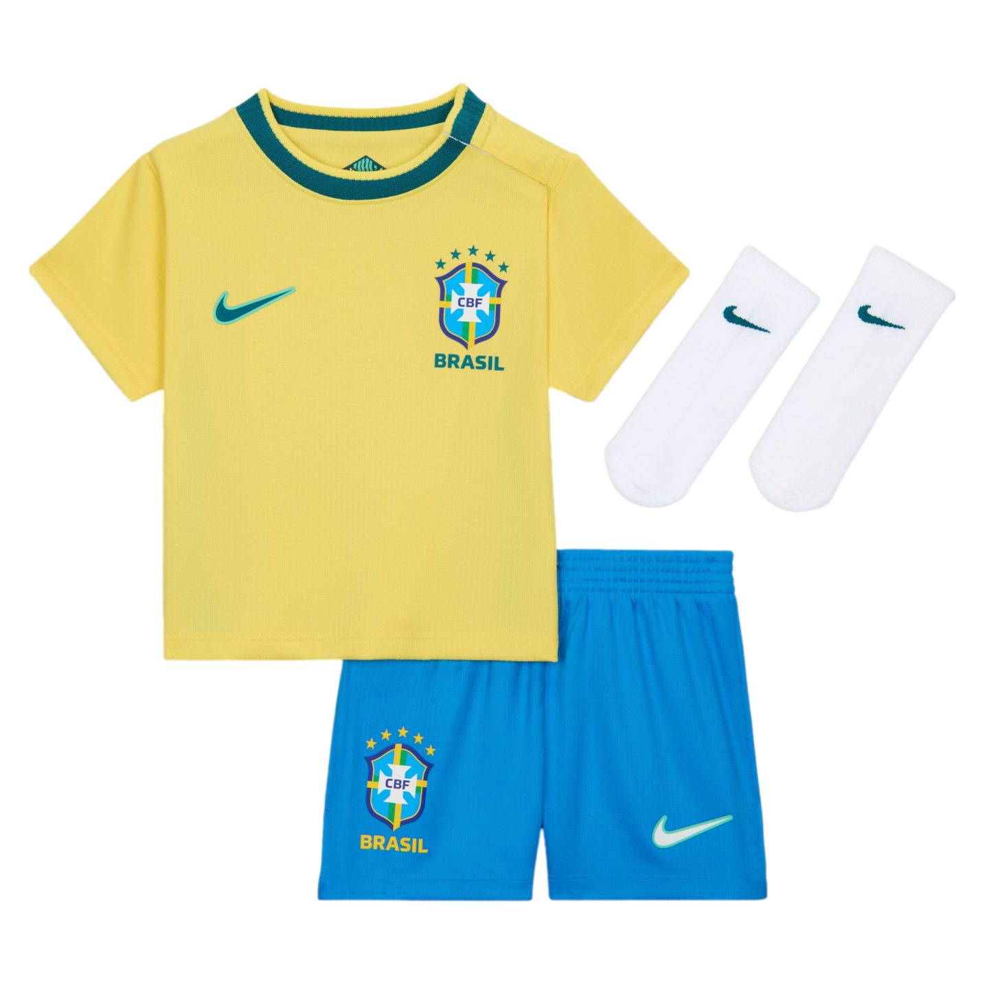 A three-piece baby or toddler Brazil national soccer team kit by Nike, consisting of a yellow short-sleeved jersey with a green collar, blue elastic-waist shorts, and a pair of white crew socks, all displayed against a black background. Each piece feature