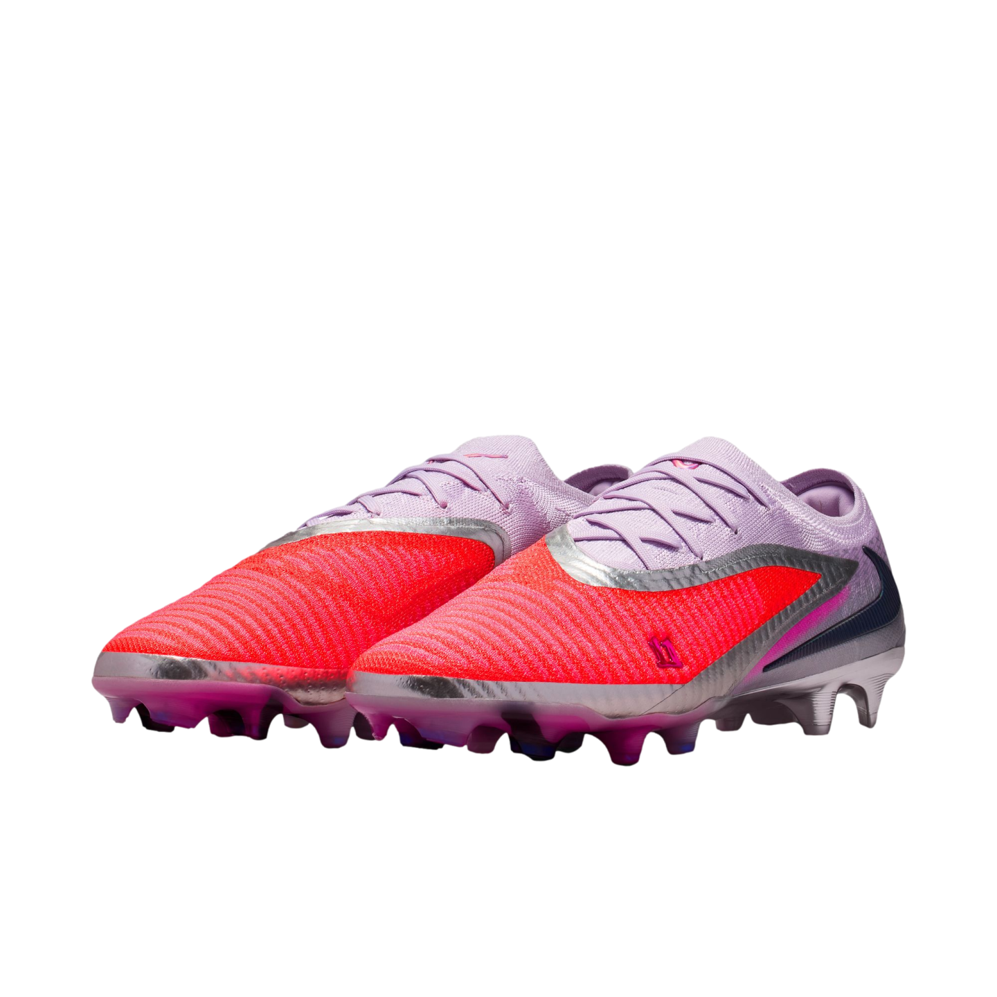 A pair of purple and bright red Nike Phantom GX soccer cleats with metallic silver accents, displayed against a solid black background.