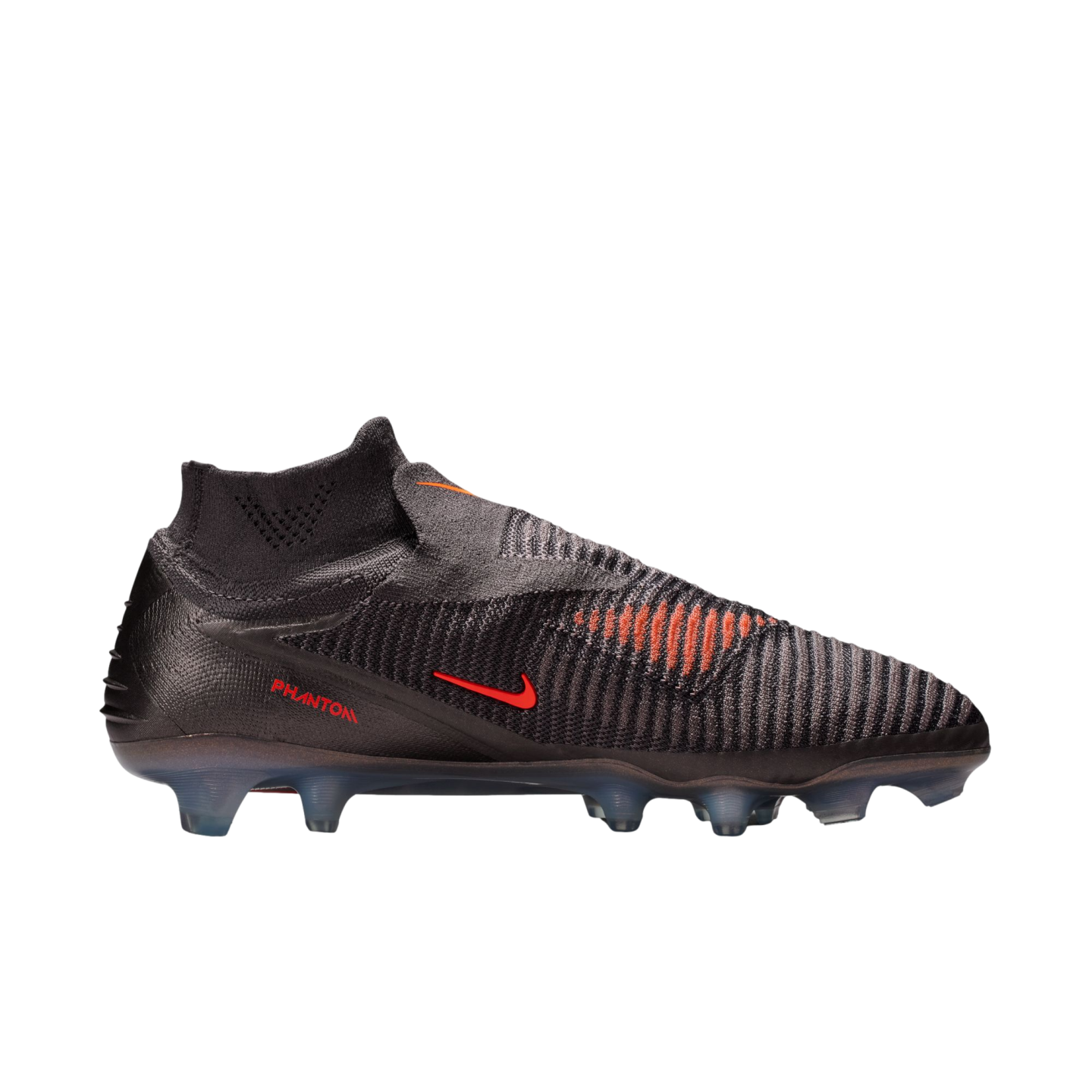 A profile view of a dark grey Nike Phantom soccer cleat with bright orange accents on a solid black background. The shoe features a textured, laceless upper with a high-top collar, a small red swoosh logo, and "PHANTOM" printed in red on the heel. The sol