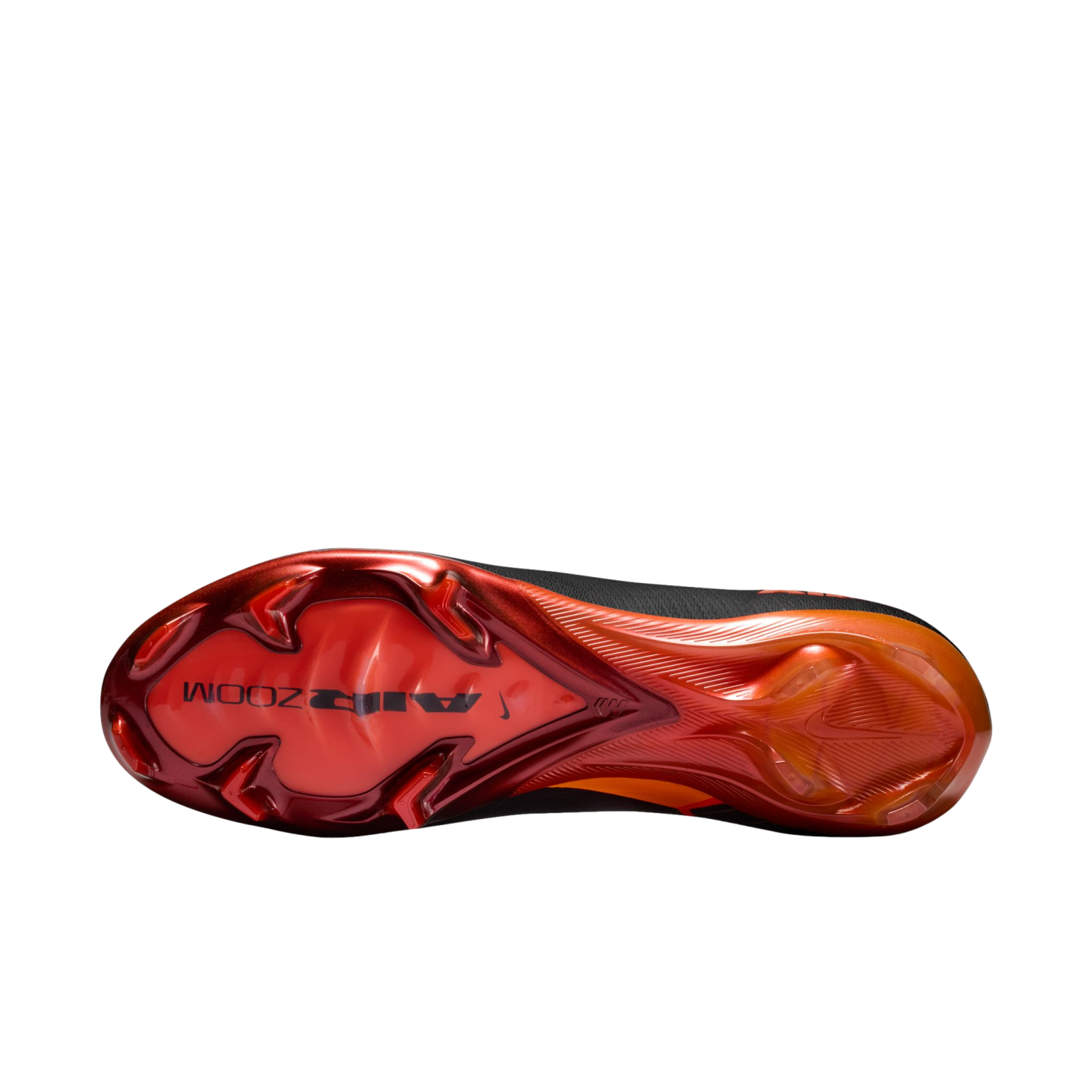 A bottom view of a Nike soccer cleat sole featuring a glossy metallic red and orange gradient against a black background. The forefoot displays chevron-shaped studs and the words "AIR ZOOM" in black.