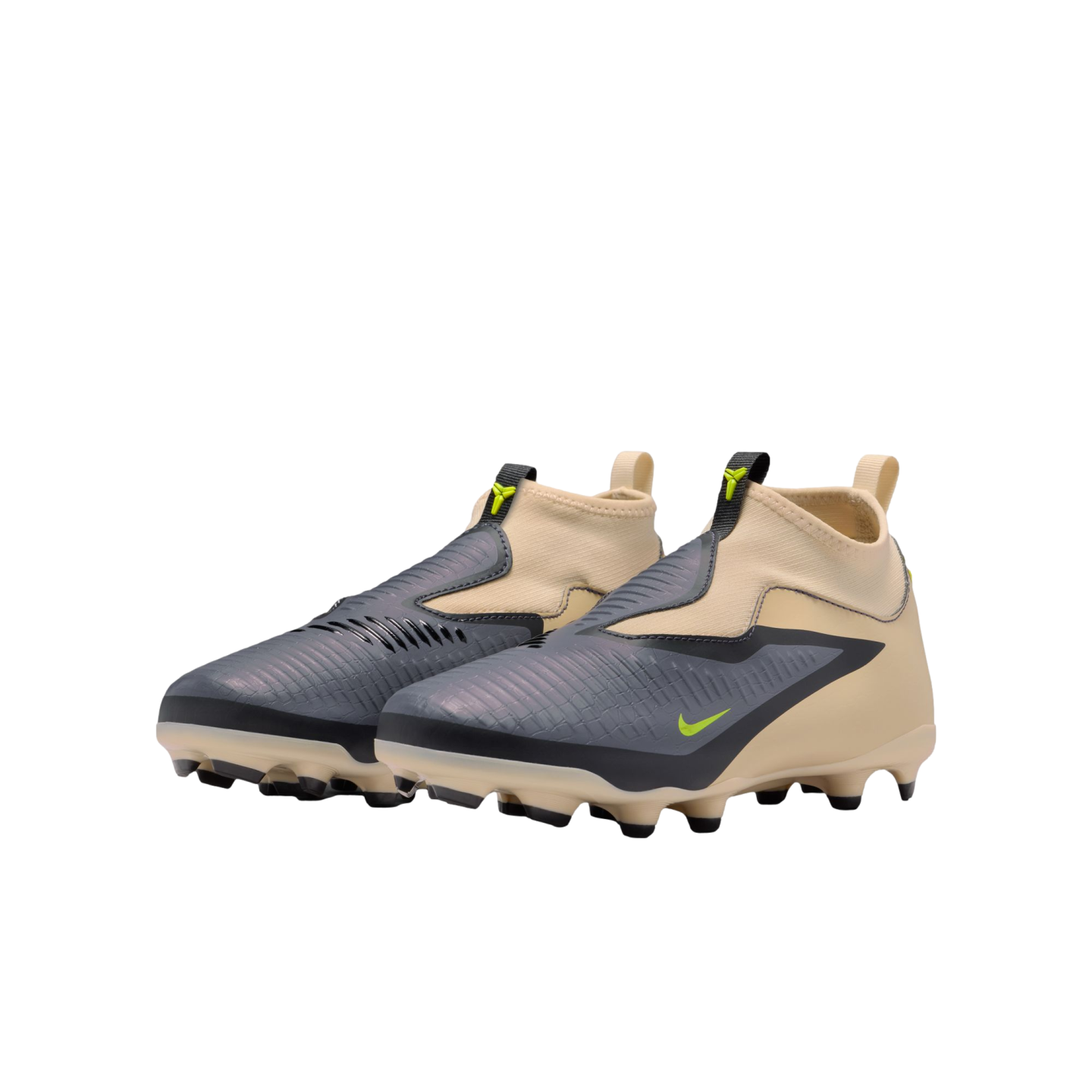 Pair of laceless Nike football boots with a tan sock-like upper and iridescent grey textured overlays. Highlights include neon green accents and a tan soleplate with black studs.