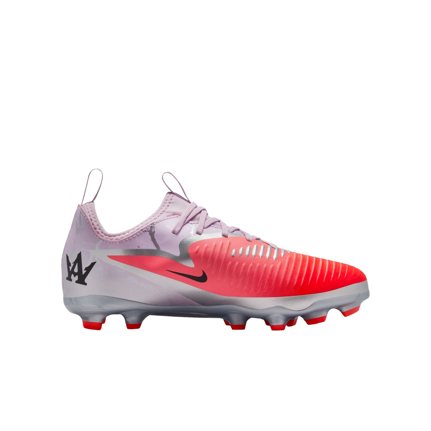 Profile of a Nike Phantom soccer cleat in pink, coral, and silver with a black swoosh and red studs, set against a black background.