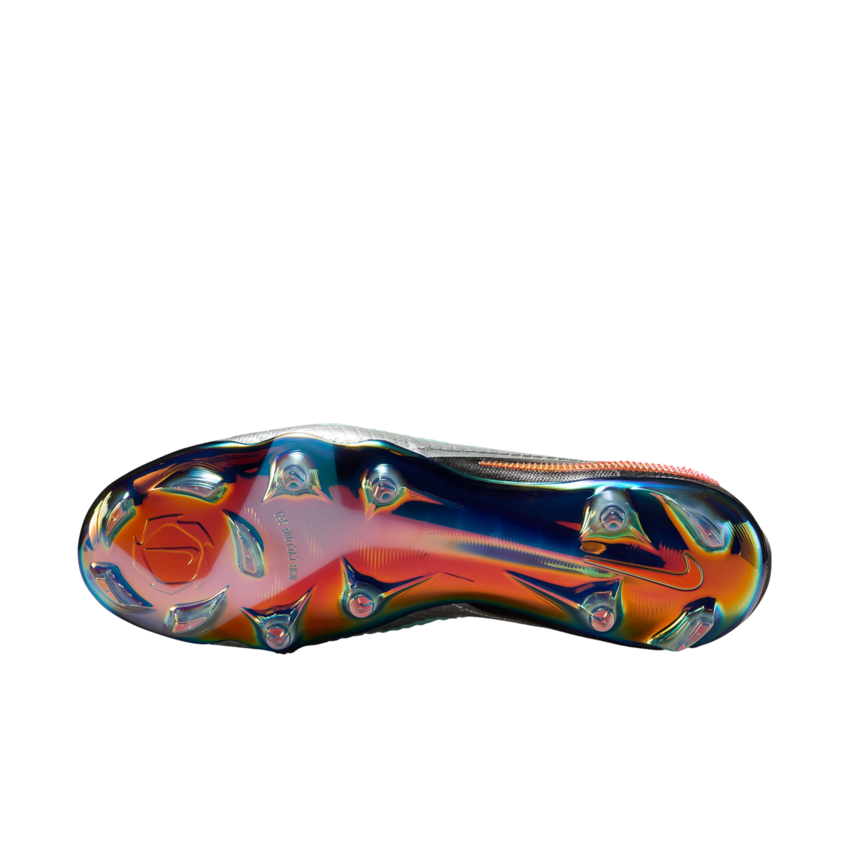 Bottom view of a Nike soccer cleat with an iridescent, multi-colored metallic sole plate and traction studs, set against a plain white background.