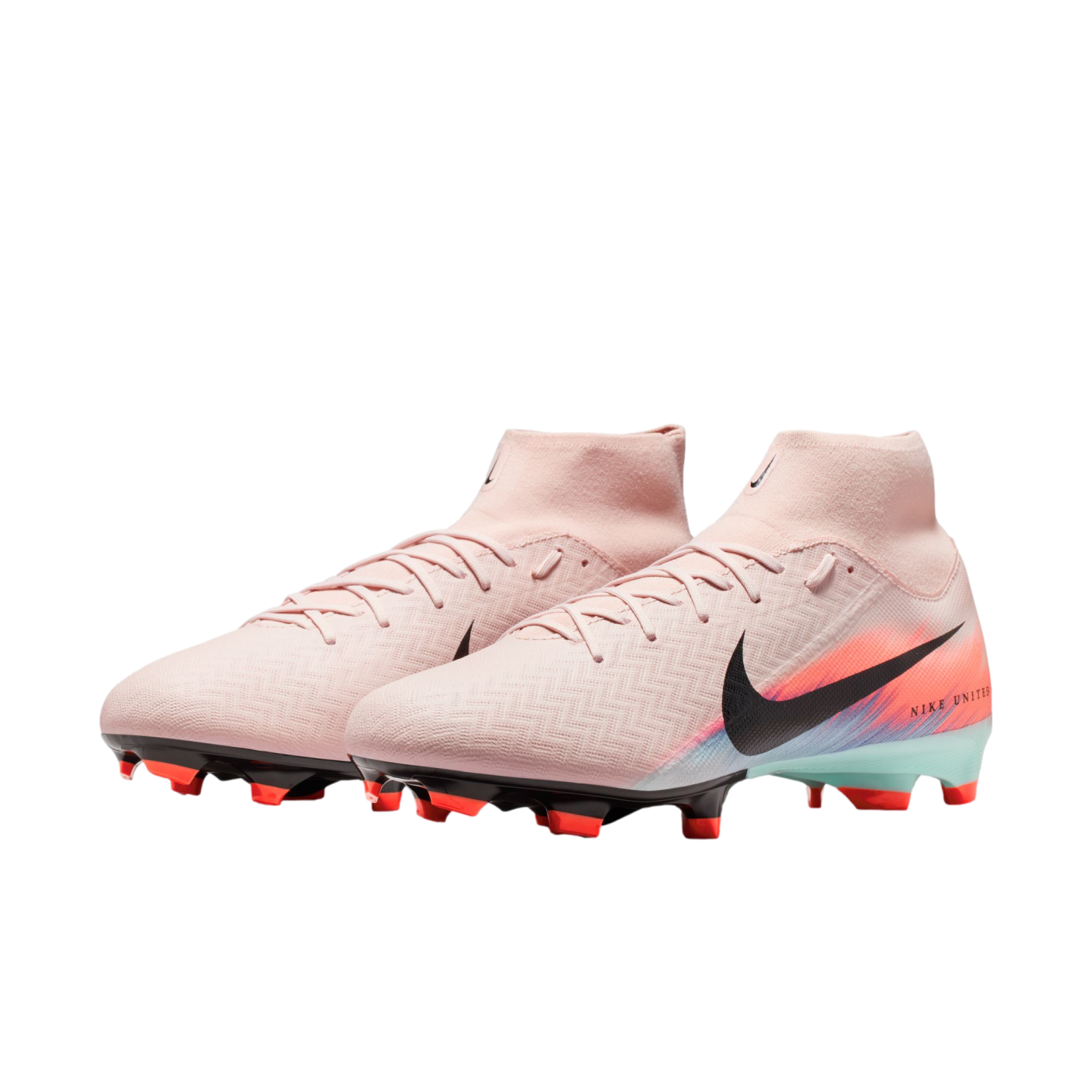A pair of light pink Nike high-top soccer cleats with black swooshes, multicolored heel accents, and red studs, isolated against a solid black background.
