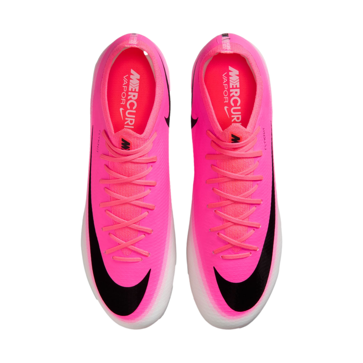 Top-down view of two bright pink Nike Mercurial Vapor soccer cleats with black swoosh logos and matching pink laces.