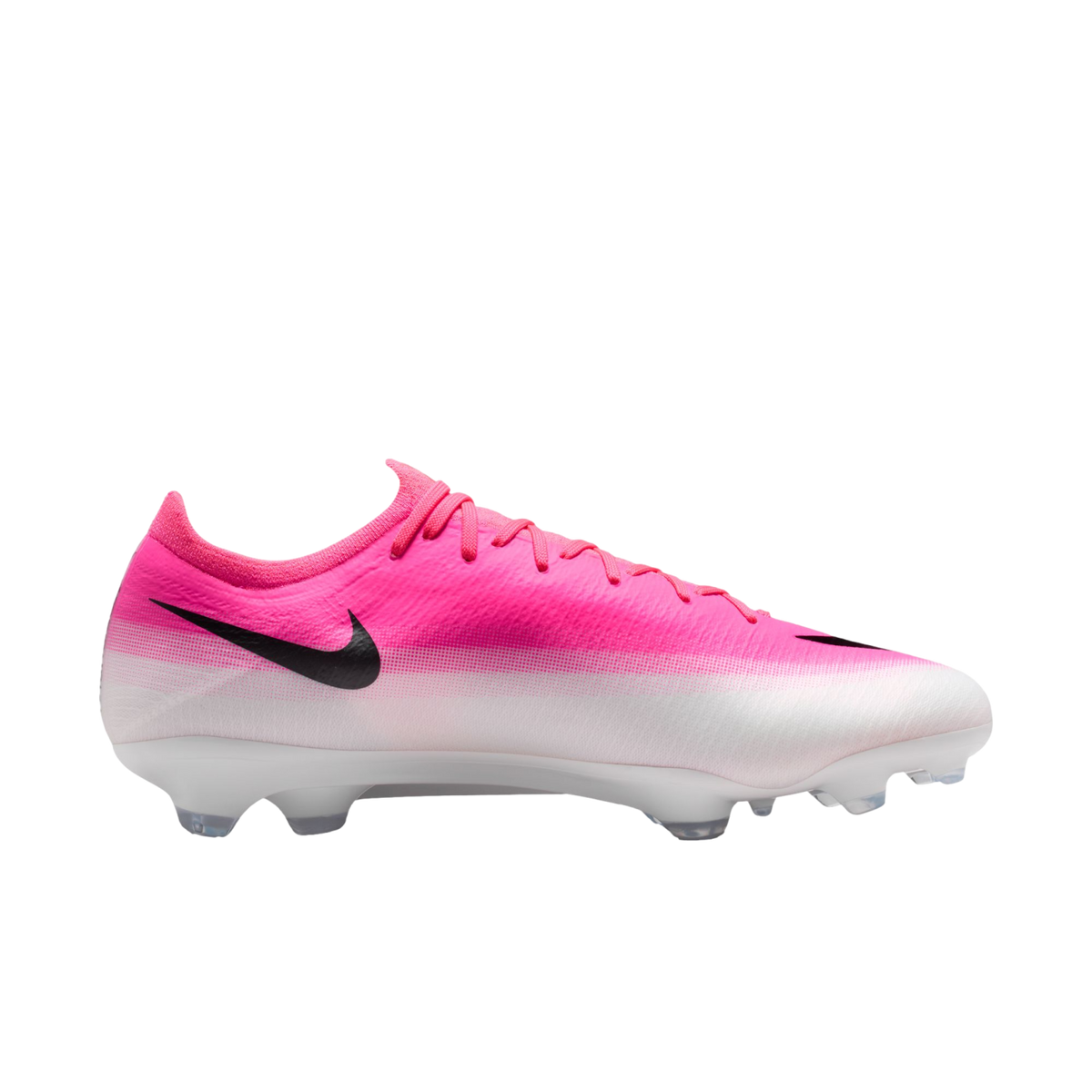Profile view of a pink and white gradient Nike soccer cleat with a black swoosh and white studded soleplate.