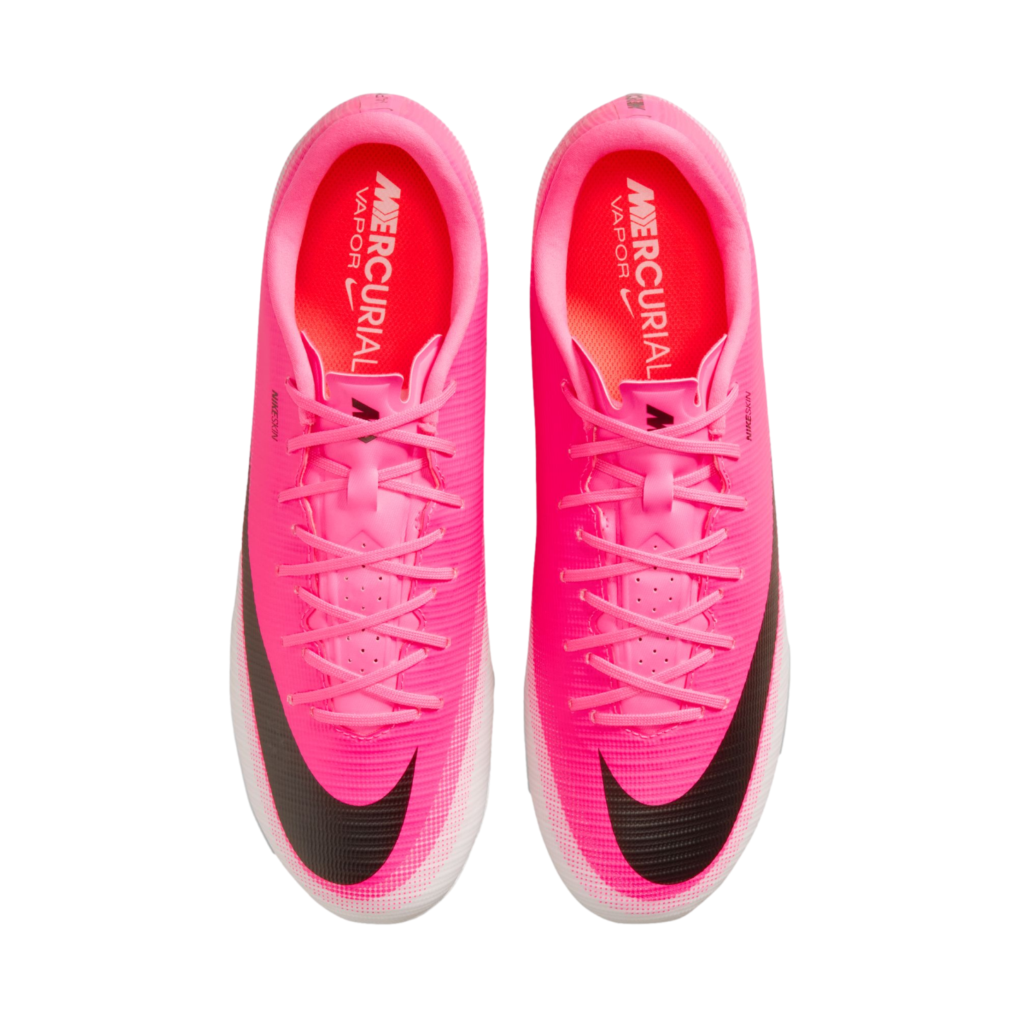 Top-down view of a pair of bright pink Nike Mercurial Vapor soccer cleats with black swooshes and pink laces against a white background.
