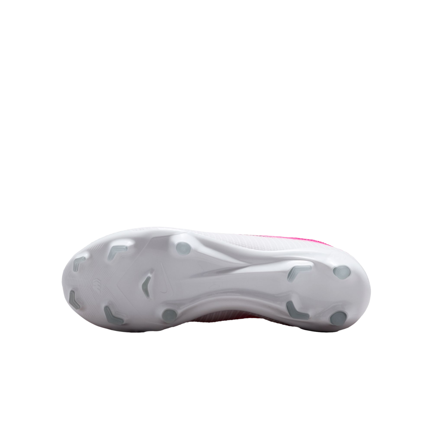 The white sole of a Nike soccer cleat features various traction studs and a faint Nike swoosh logo.