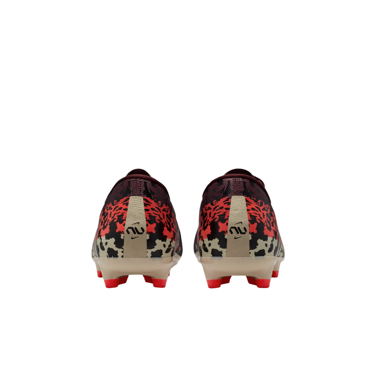 Rear view of a pair of Nike soccer cleats featuring a pixelated camouflage pattern in red, black, and maroon, with tan heel strips and bright red studs against a black background.