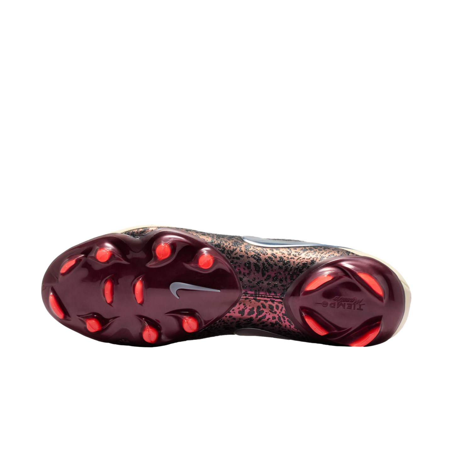 Soleplate view of a Nike Tiempo soccer cleat featuring a dark burgundy base with bright orange studs and a metallic bronze leopard-print pattern on the upper, set against a solid black background.