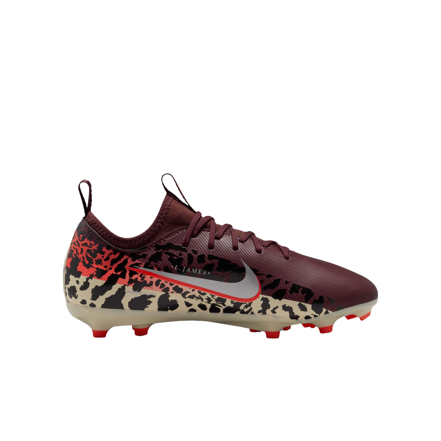 A side-profile view of a Nike soccer cleat against a solid black background. The shoe features a maroon upper with matching laces and a lower section decorated with a tan and black leopard print that transitions into red at the heel. A large silver Nike s