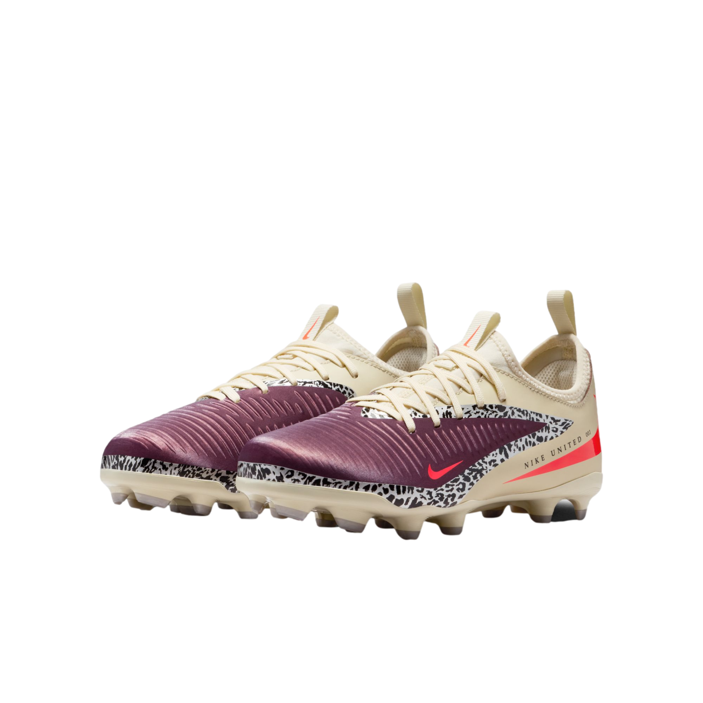 A pair of Nike soccer cleats featuring a deep purple textured forefoot, cream-colored heel and laces, and a black-and-white leopard print midfoot accent, set against a solid black background.