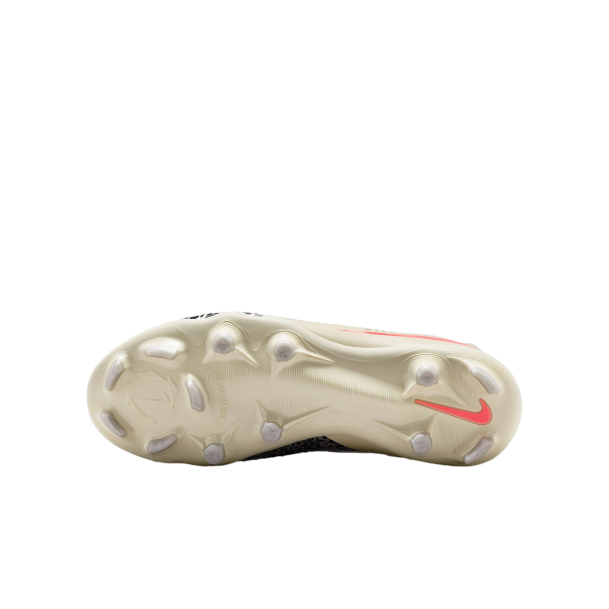 The cream-colored soleplate of a Nike football boot featuring a coral swoosh and various studs, centered against a black background.