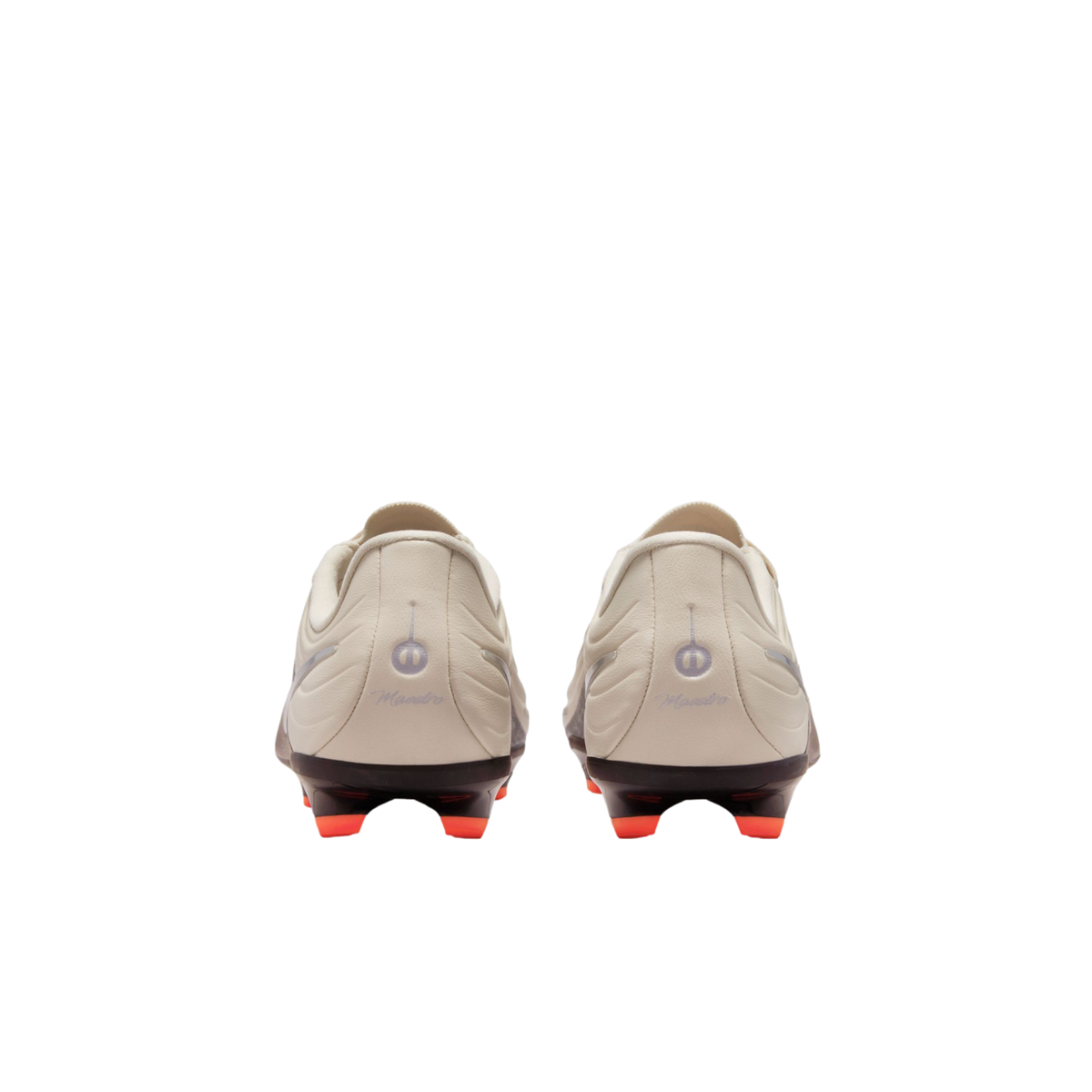 A rear view of a pair of off-white soccer cleats against a black background, featuring black soleplates with bright orange studs and "Maestro" scripted on each heel.
