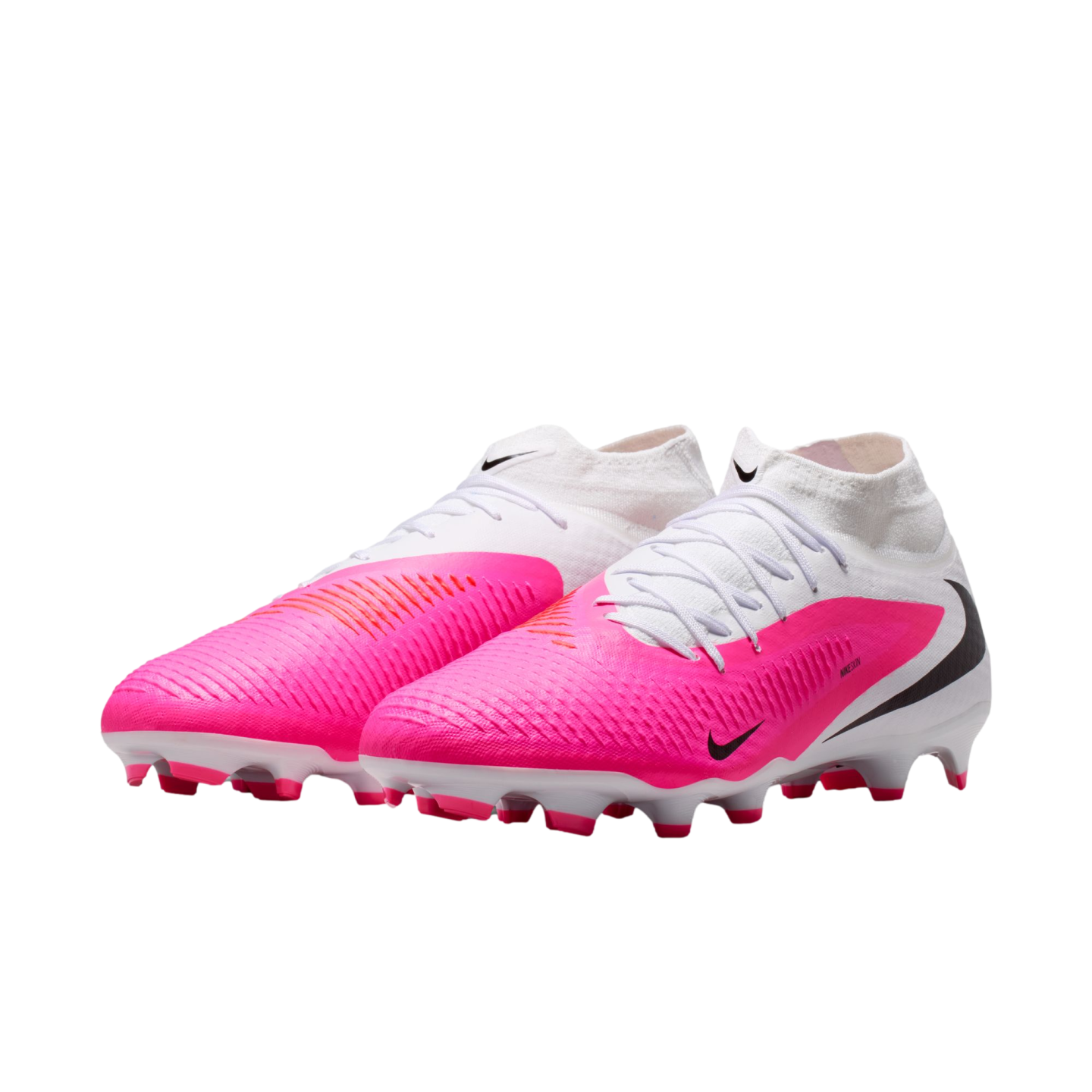 A pair of white and bright pink Nike soccer cleats. They feature textured pink forefeet, white high-top collars, and black Nike swooshes on the sides.