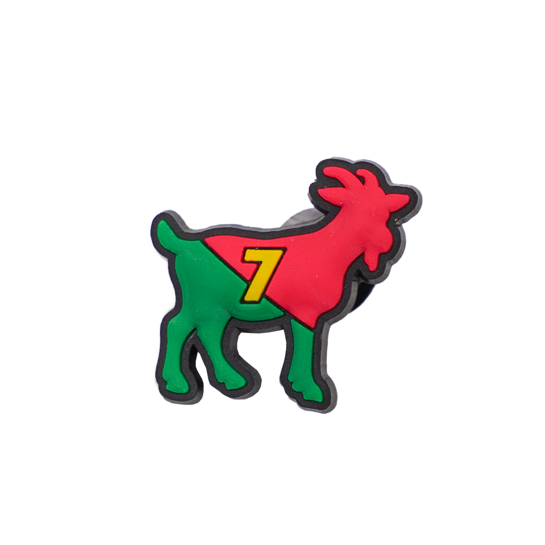 A Soccer Croc Charm in the shape of a goat, featuring the red and green colors of the Portugal national team with a yellow number 7 on its side.