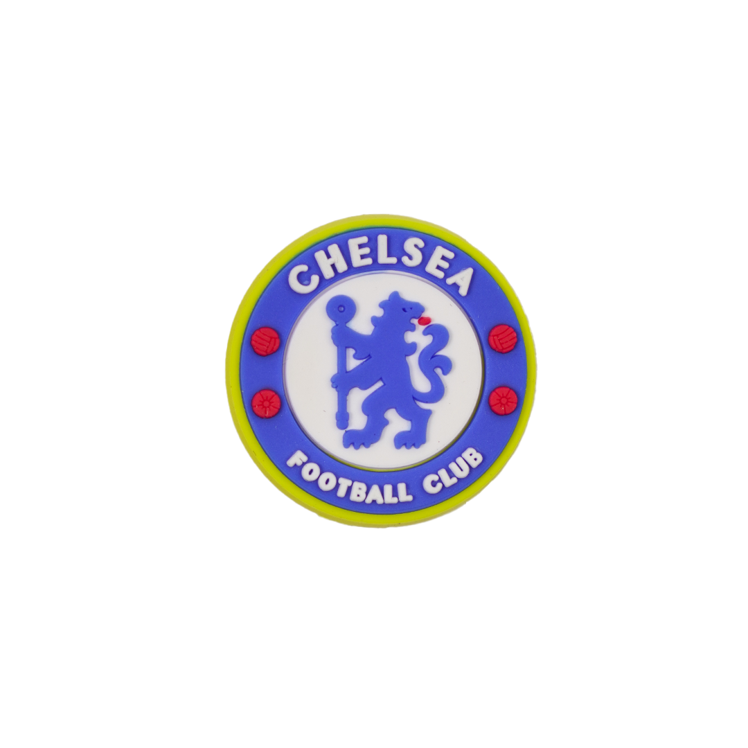 A Soccer Croc Charm featuring the Chelsea Football Club logo, with a blue lion on a white background, a blue ring with white text, and a yellow outer rim.