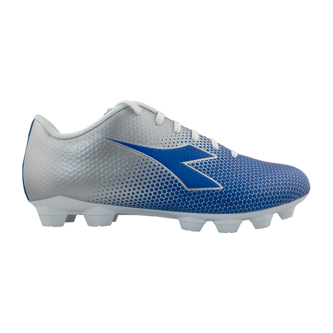 A side-view profile of a silver and blue Diadora soccer cleat with a textured honeycomb pattern, white laces, and white molded cleats.