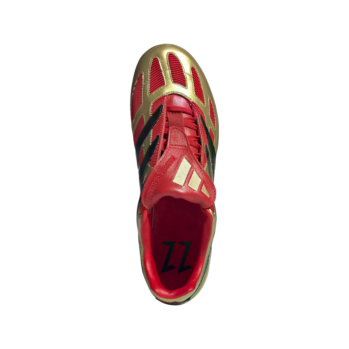 Top-down view of a red and gold Adidas Predator soccer cleat with a fold-over tongue and "ZZ" branding on the insole.