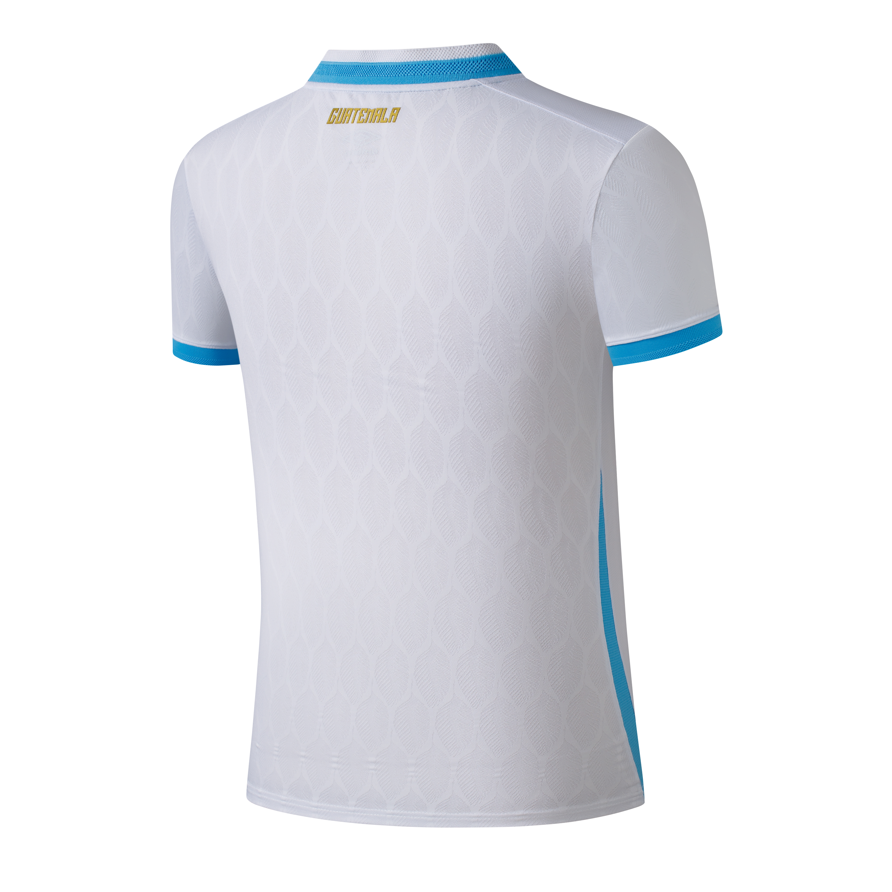 Back of a white sports jersey with light blue collar and sleeve trim. "GUATEMALA" is in gold lettering below the collar. The fabric has a tonal embossed pattern.