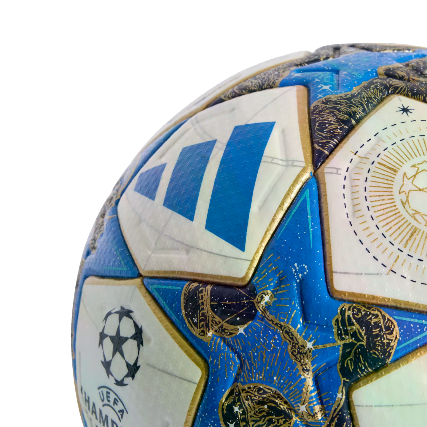 Close-up of an Adidas UEFA Champions League soccer ball featuring white, blue, and gold star panels with cosmic illustrations.
