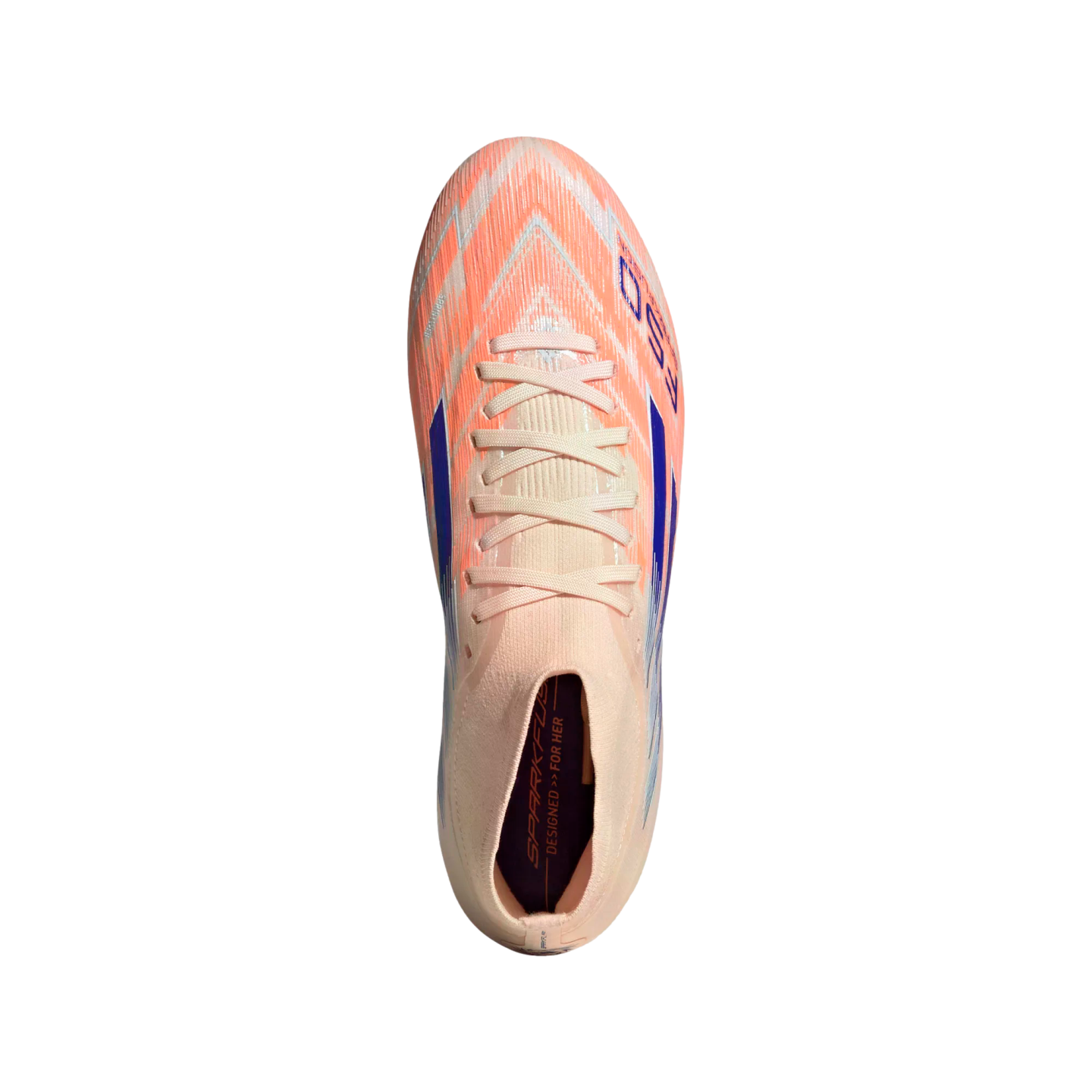 Top-down view of a peach and white soccer cleat with blue accents, featuring "DESIGNED FOR HER" text on the insole, isolated on a black background.