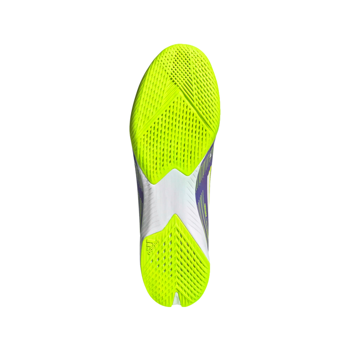 Underside view of a neon yellow Adidas indoor soccer shoe sole with complex geometric traction patterns and purple and white accents.