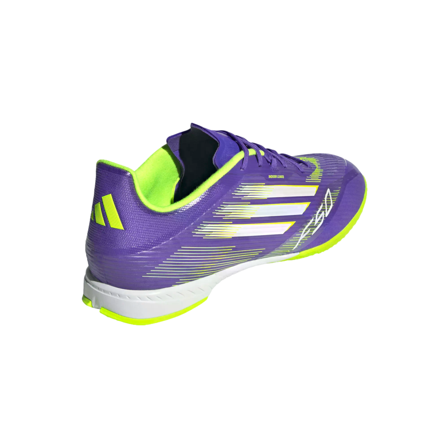 A purple and neon green Adidas F50 indoor soccer shoe with white stripes and a lime green interior, shown from a rear-angled perspective against a black background.