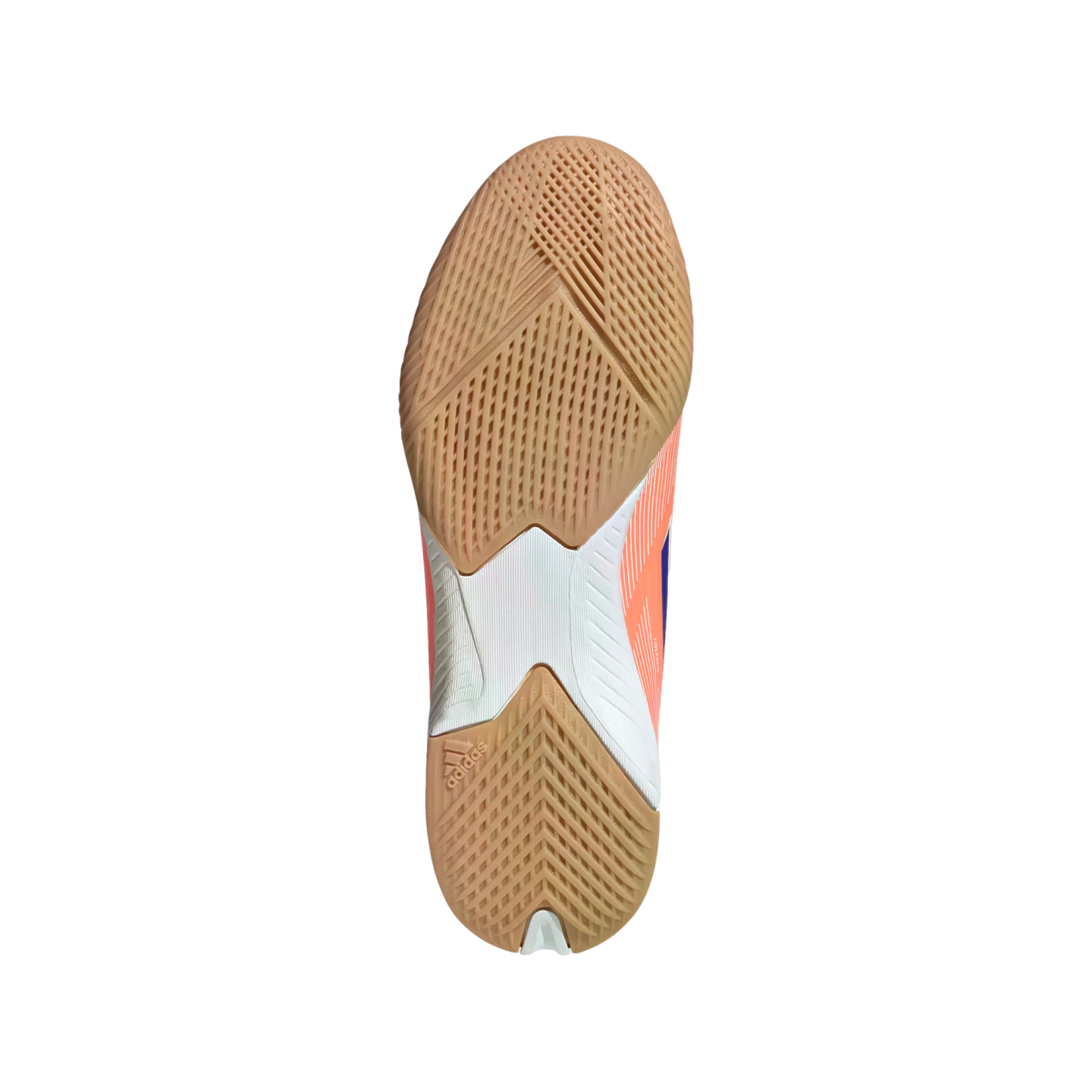 The textured tan gum rubber outsole of an Adidas indoor sports shoe, showing intricate grip patterns and white and peach accents on the midfoot.