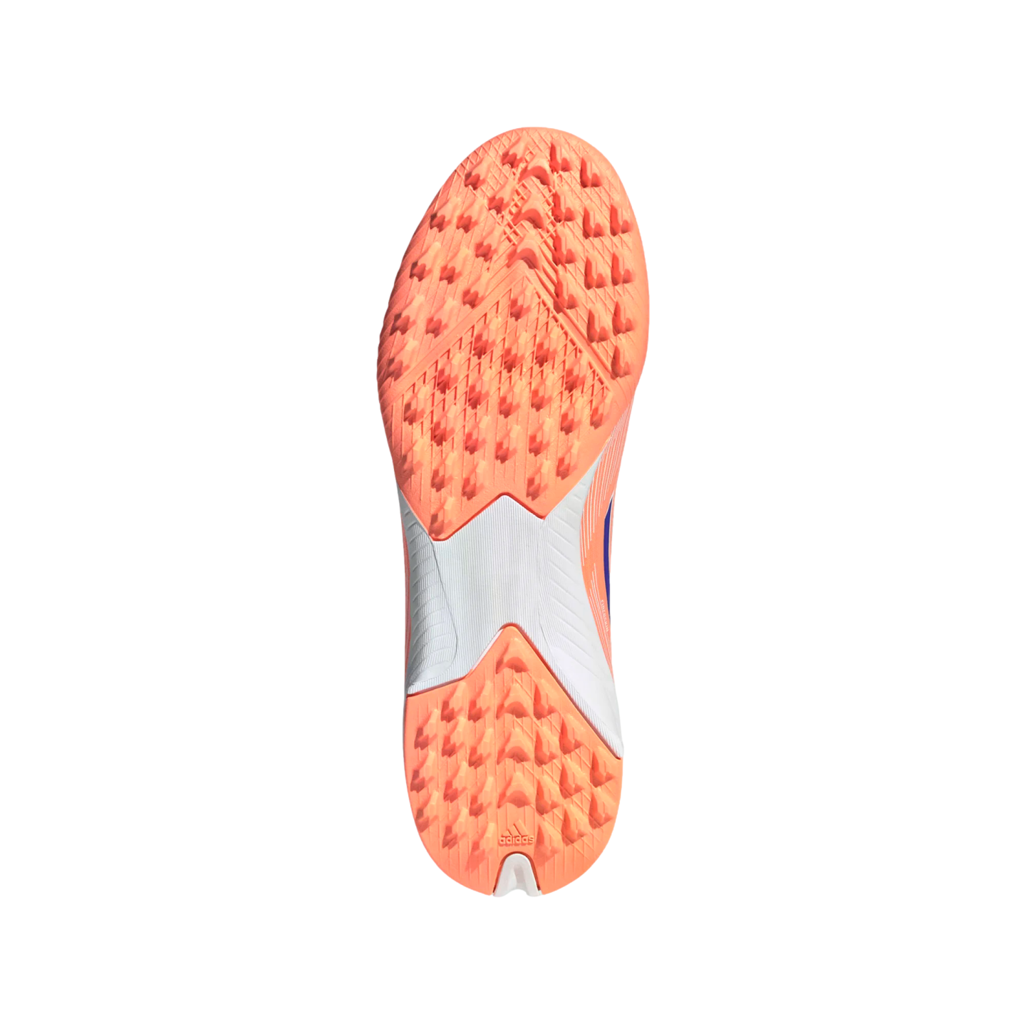 Underside of an orange and white Adidas turf soccer shoe featuring a multi-studded traction pattern on a solid black background.