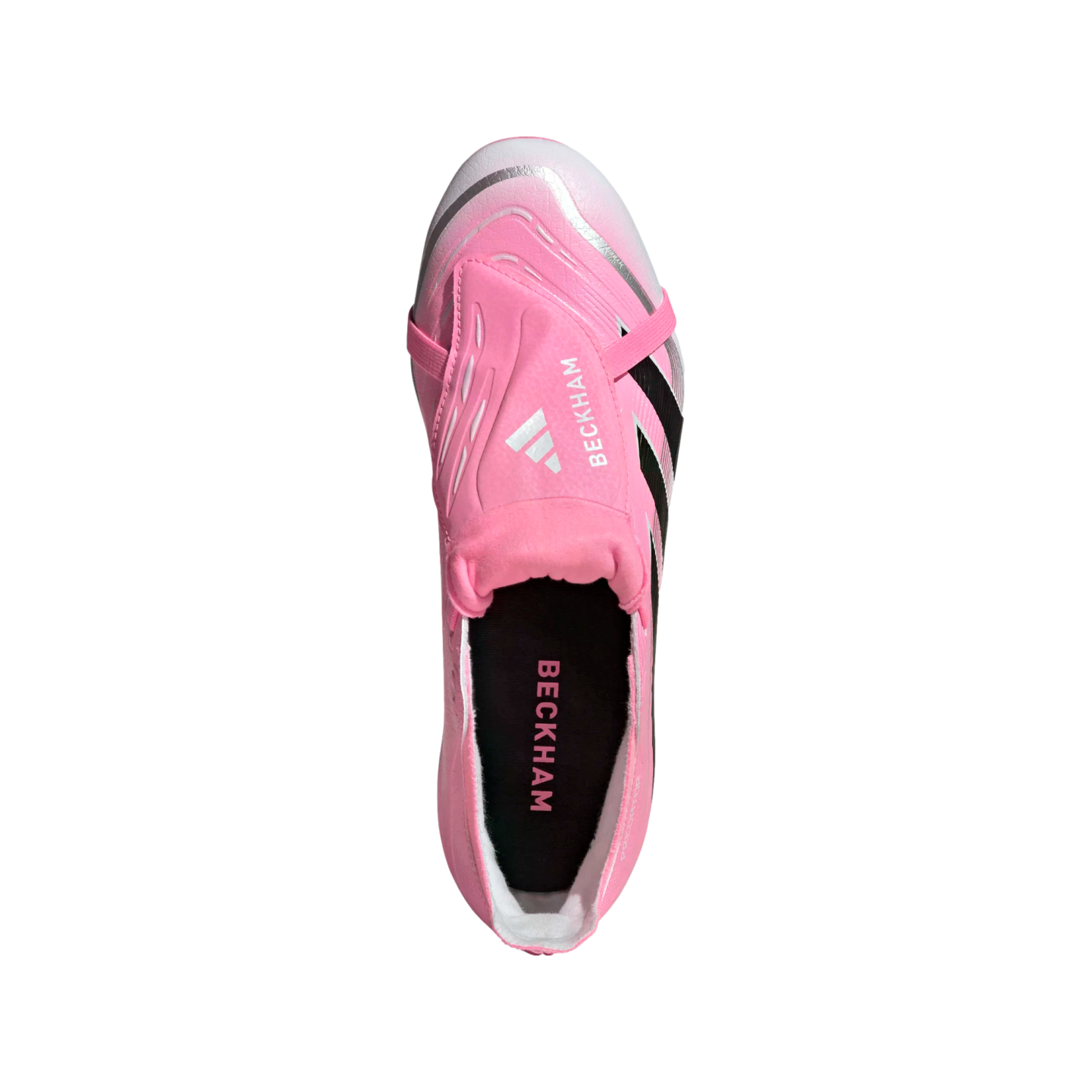 Top-down view of a pink Adidas soccer cleat with "BECKHAM" on the fold-over tongue. It features silver accents and black stripes.