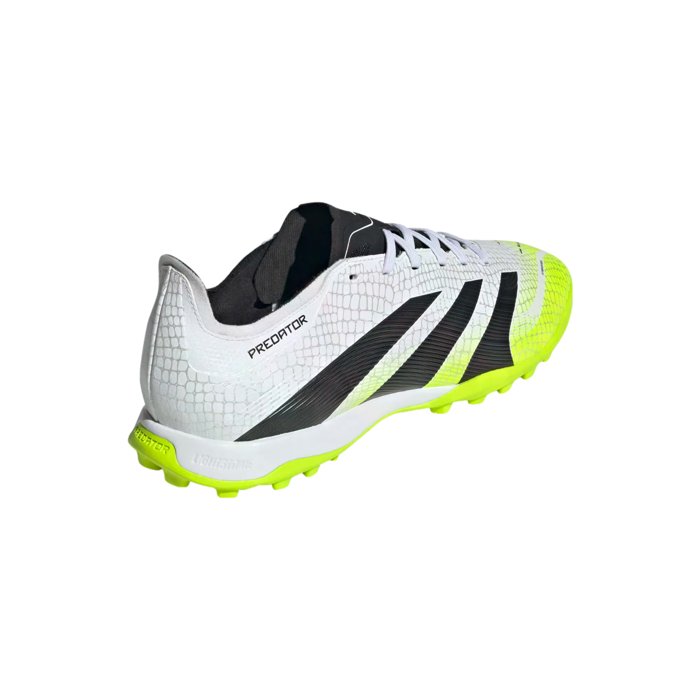 A white Adidas Predator turf soccer shoe with neon yellow accents, black stripes, and a scale-like texture, shown from a rear-side view.